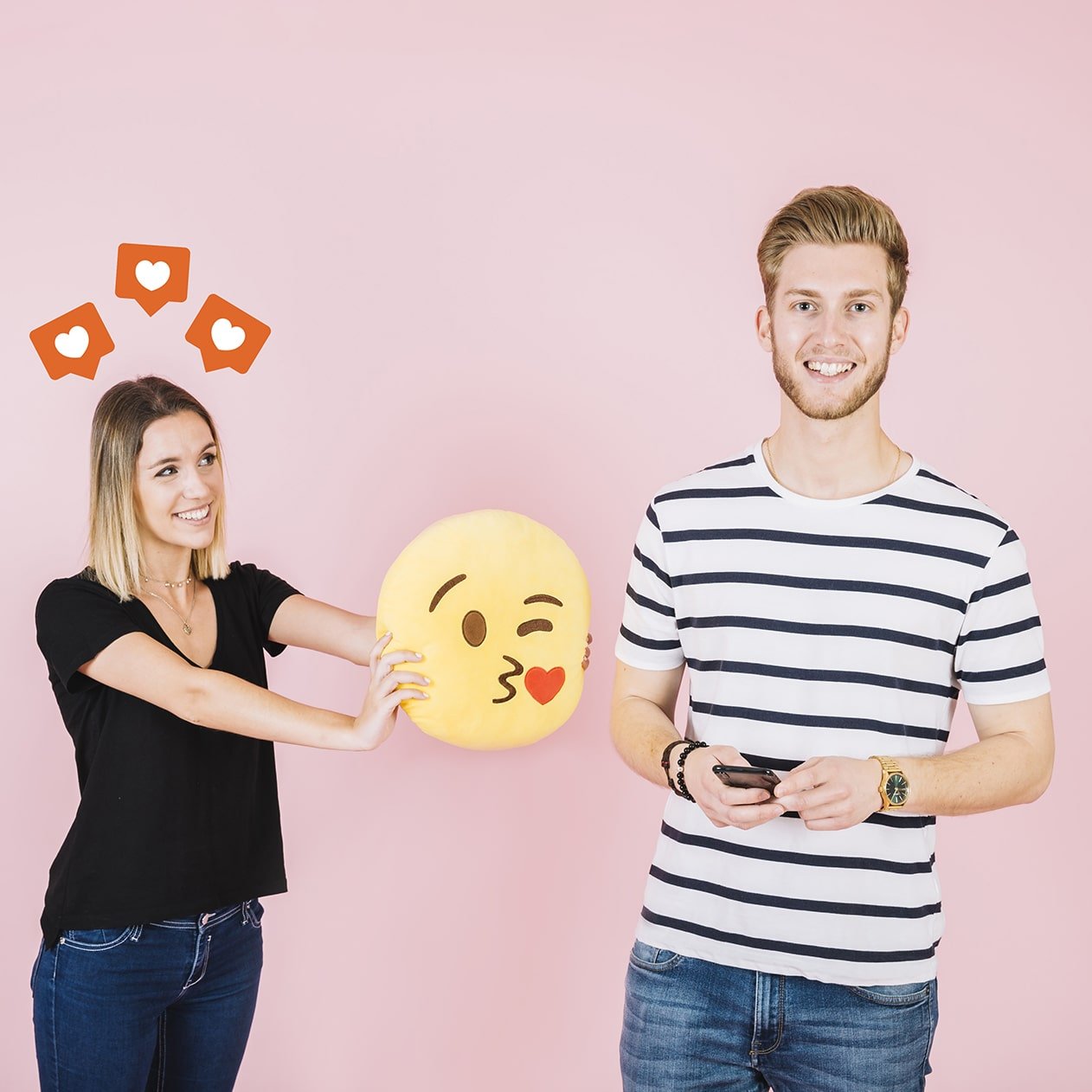 love-icons-happy-woman-holding-kiss-emoji-near-her-boyfriend-min